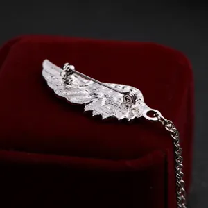 Broche vintage de ala de ángel plateada con cadena borla para accesorios de traje hombre