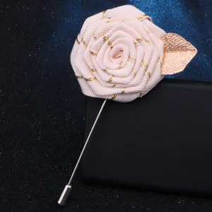Handmade ribbon rose brooch lapel pin with gold leaf detail, elegant vintage clothing accessory.