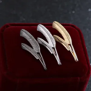 Exquisite metal feather brooch set featuring silver, gold and dark grey alloy pins for suits.