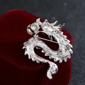 Silver dragon brooch with pearl detail, elegant men's suit lapel pin accessory.