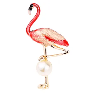 Elegant flamingo brooch with pearl and enamel alloy design for women sweater coat wear.