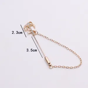 Men vintage anchor brooch pin with chain crystal suit lapel jewelry accessory detail shot