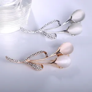 Bellissima spilla a forma di tulipano con strass lucidi e pietra occhio di gatto per donna.