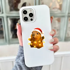 Cute Christmas capybara phone case detail view, festive winter holiday decoration style.