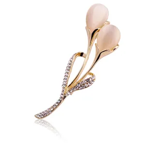 Elegante spilla a tulipano placcata in oro con pietra occhio di gatto e strass per donne.