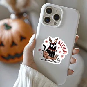 Waterproof fun black cat Christmas theme decorative sticker on white phone case detail.