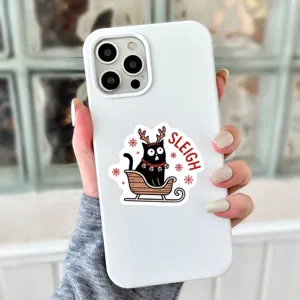 White phone case with cute black cat Christmas sleigh sticker, protective cover for mobile.