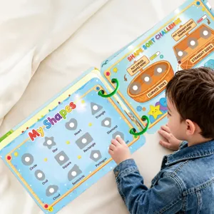 Detailed view of kids quiet book, interactive shape sorting page for early educational learning.