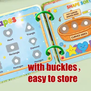 Detailed view of educational quiet book showing shape sorting activities with cute cartoon designs.