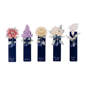 Watercolor botanical paper bookmark set close-up view with delicate floral art and names.