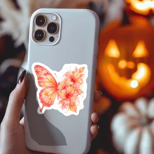 Close-up of cute watercolor butterfly and flower sticker design on light grey phone case detail.