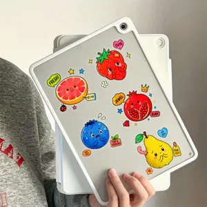 Close-up detail of cute cartoon fruit PET transparent waterproof stickers with healing expressions.