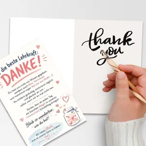 Detailed view of teacher thank you greeting card with cute hand-drawn hearts and warm message.