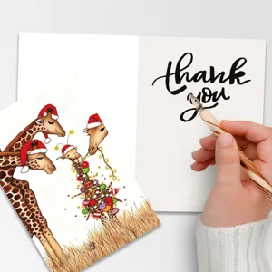 Biglietto d'auguri di Natale dettaglio con simpatica illustrazione di giraffa