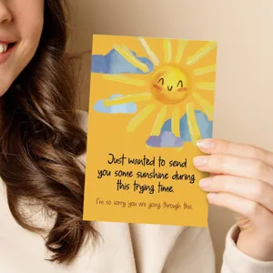 Sunshine sympathy greeting card detail showing warm encouraging message and cute sun illustration design.