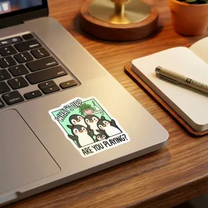 Cute cartoon penguin sticker detail view, waterproof vinyl decal for laptop decoration.