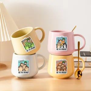 Cute ceramic coffee mug set with funny cartoon animal stickers, perfect for home and office use.