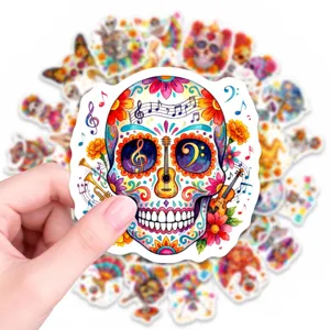Detail view of colorful Day of the Dead skull sticker with floral and musical patterns.