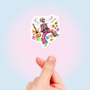 Detailed view of the Day of the Dead skeleton sticker with colorful floral and guitar design.