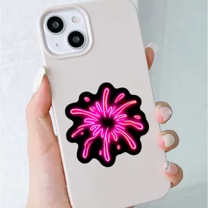 Detailed close-up of colorful neon firework sticker on a phone case, creative design.