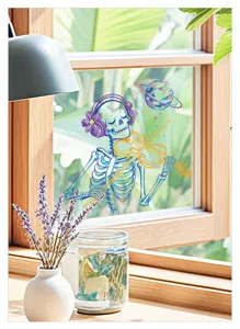 Detailed view of the colorful skeleton window sticker showing festive Halloween decor on glass.