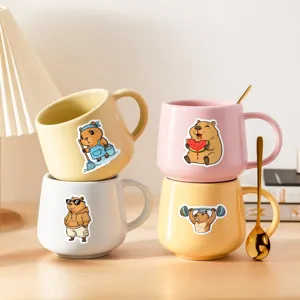 Cute ceramic capybara mugs set with golden spoons for coffee, milk, and tea daily use.