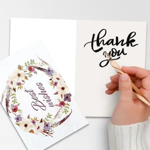 Detail view of floral greeting cards with calligraphy writing best wishes and thank you.
