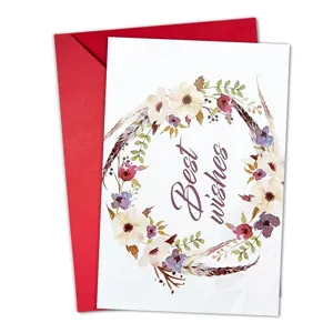 Watercolor floral greeting card detail view with red envelope and warm wishes text