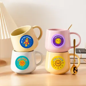 Cute ceramic mug set with lovely cartoon sun and rocket patterns, perfect for daily coffee.