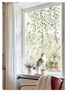 Close-up of decorative window sticker featuring daisy vines, cute cat and butterflies for home glass.