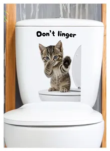 Détail d'autocollant de toilette chat drôle, design de chaton mignon, déco salle de bain.