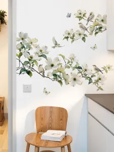 Detail de sticker mural arbre et fleurs botaniques oiseau pour decoration fond de maison.