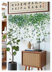 Vue detaillee de l'autocollant mural de vigne vegetale avec feuilles vertes et decor.