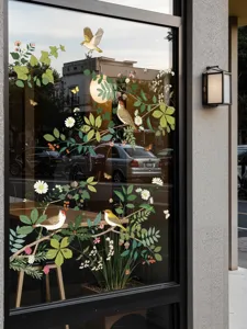 Gedetailleerd overzicht van bloem vogel glasraamstickers, ideaal voor huisdecoratie en anti-botsing.