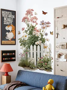 Sticker mural floral amovible avec fleurs de printemps florissantes et clôture blanche.