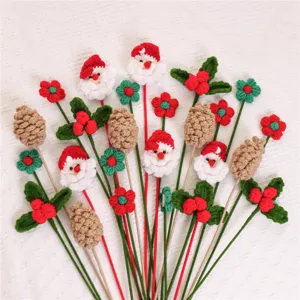 Handmade crochet Christmas bouquet with Santa Claus and pinecones
