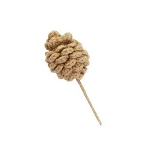 Exquisite handmade brown crocheted pinecone decoration for creative Christmas bouquets