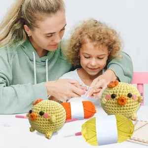 DIY crochet cute chicken yarn kit detail showcasing handmade craft process and finished toys