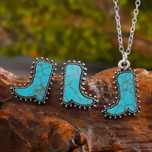 Nahaufnahme des Western-Stiefel Türkis Schmucksets mit Ohrringen und passendem Kettenanhänger.