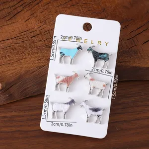 Joli ensemble de boucles d'oreilles clous métal forme chèvre texture fausse fourrure mode