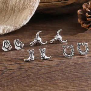 Vintage Western Cowboy Ohrringe Set mit Stierkopf Stiefeln und Hufeisen Motiv.