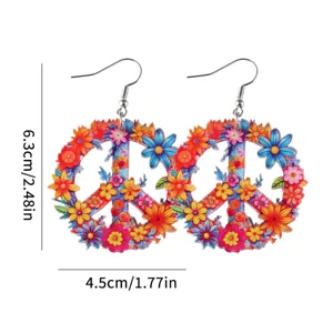 Orecchini pendenti hippie in acrilico con segno di pace floreale e dettagli colorati.