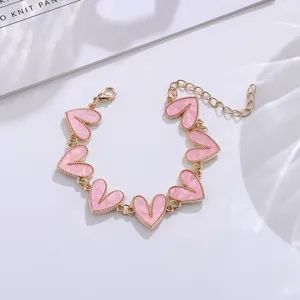 Modisches Legierung rosa Herz Armband Bonbonfarben Schmuck Detailansicht Nahaufnahme