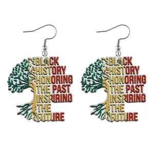 Wooden earrings featuring Tree of Life design and Black History Month quote for women and girls.