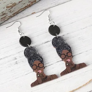 Wooden African queen portrait drop earrings detail closeup, ethnic drop jewelry design