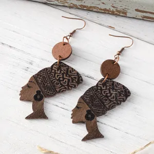 Wooden African queen silhouette drop earrings with geometric patterns and bronze hooks for women.