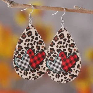 Pendientes colgantes de cuero PU con estampado de leopardo y corazón para San Valentín.