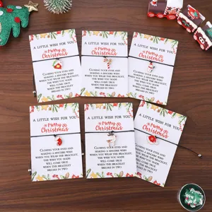 Juego de pulseras trenzadas de Navidad con dijes de aleación bonitos y tarjetas regalo.