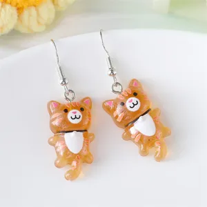 Leuke oranje kat hars oorbellen bungelen voor vrouwen, grappige cartoon dier sieraden.