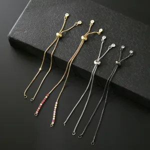 Adjustable slider bracelet components with crystal ends in gold and silver finish.